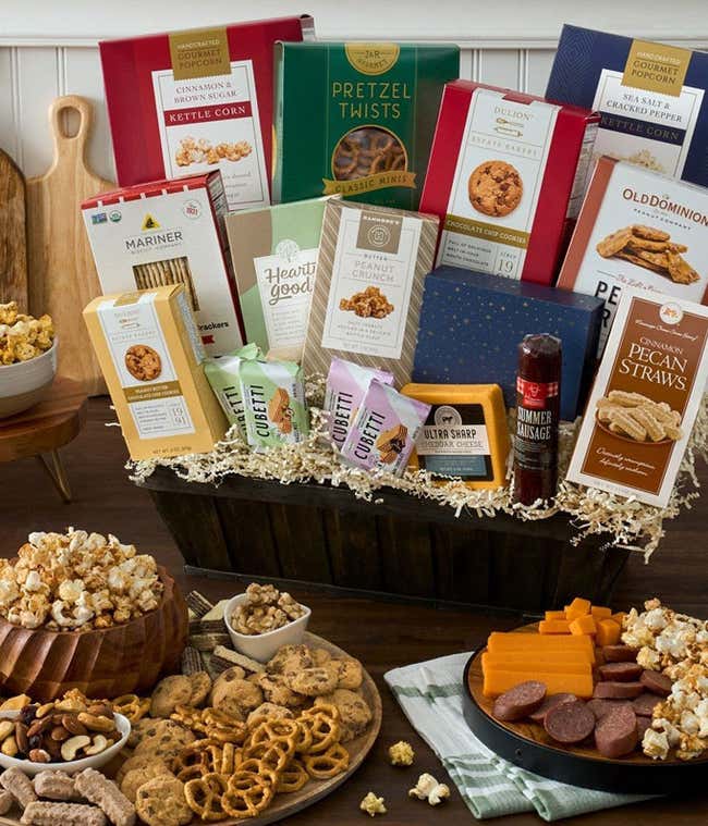 Gourmet snack basket with cheese, chocolate, sausage and more