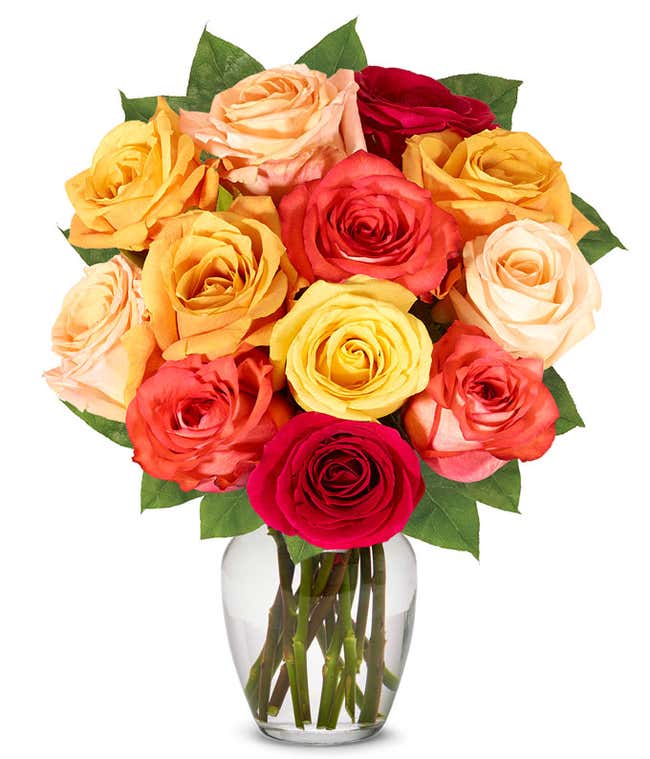A stunning floral arrangement featuring orange roses, red roses, and yellow roses, optionally presented in a glass vase.
